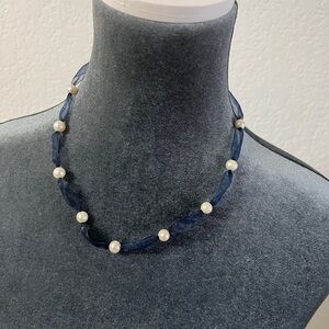 Mauritian fresh water pearl necklace on blue ribbon. Adjustable. Can be bracelet